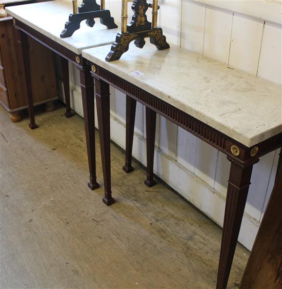 Pair of mahogany marble topped hall tables